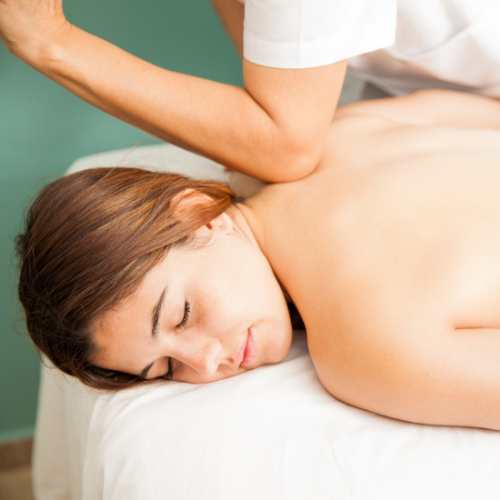 deep tissue massage on the back using an elbow