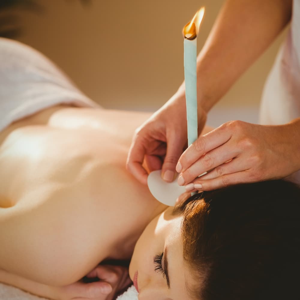 hopi ear candling treatment being shown in dronfield